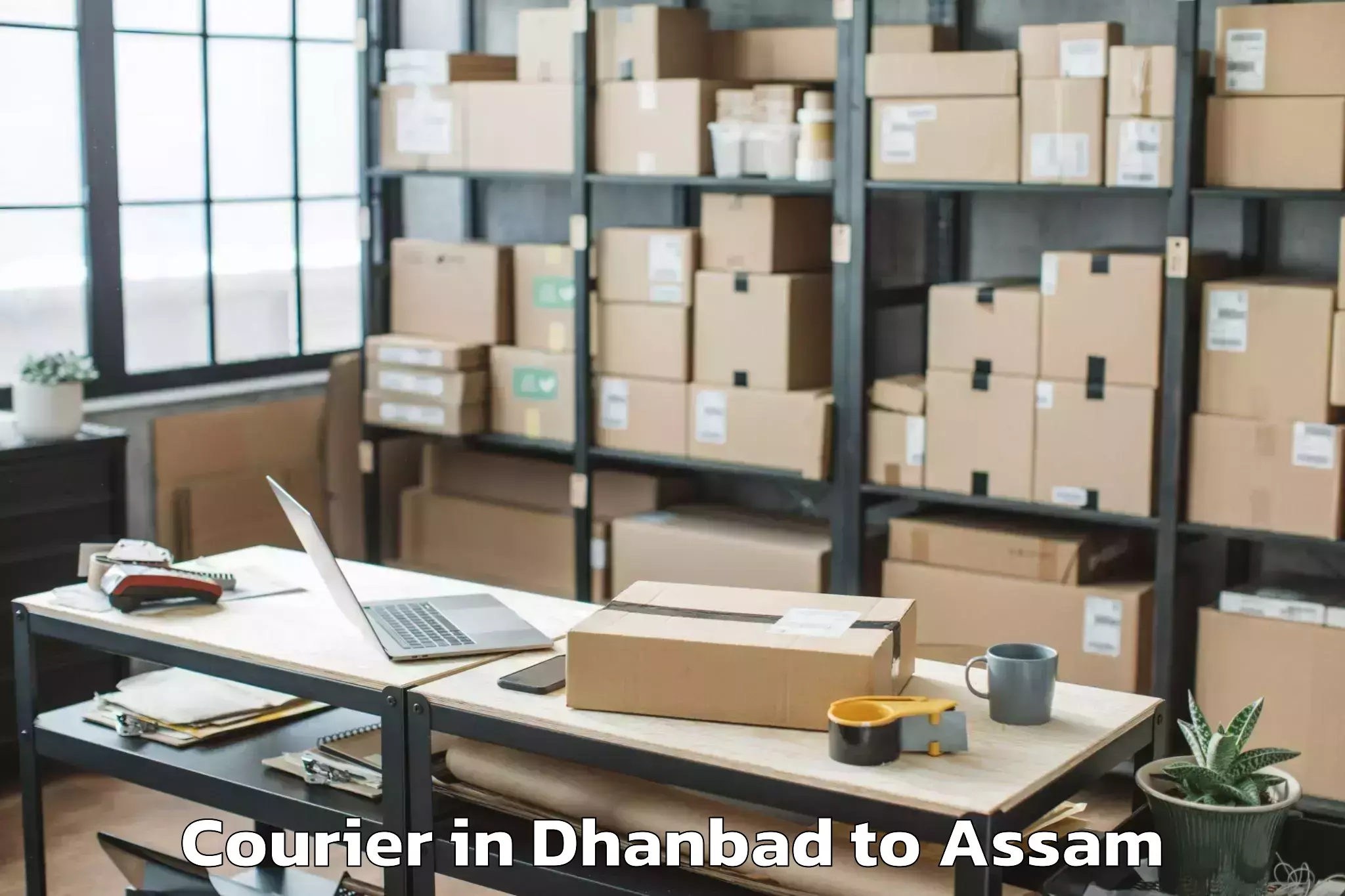 Easy Dhanbad to Guwahati University Courier Booking